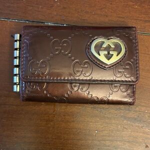 Gucci Burgundy Embossed GG Leather Key & Card Holder with Gold Heart Logo